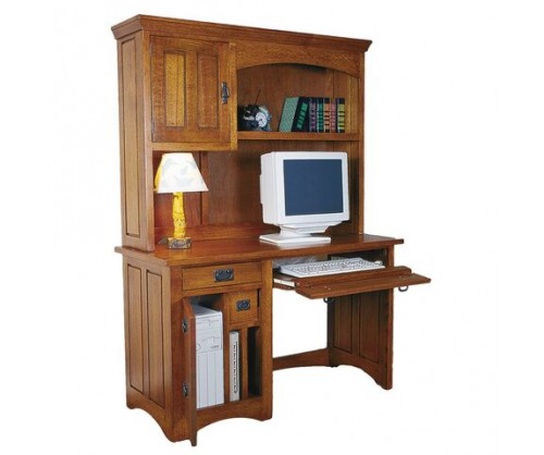 Traditional computer desk with lower and upper cabinets for storage with a 1990's computer and keyboard on the desk