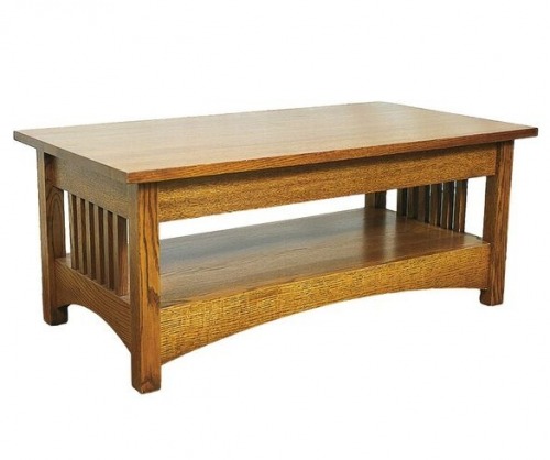 Light stained wooden coffee table with spindles on the ends