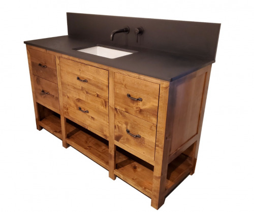 Blonde wooden vanity with 6 drawers and three shelves, a dark countertop, square sink and dark water faucet
